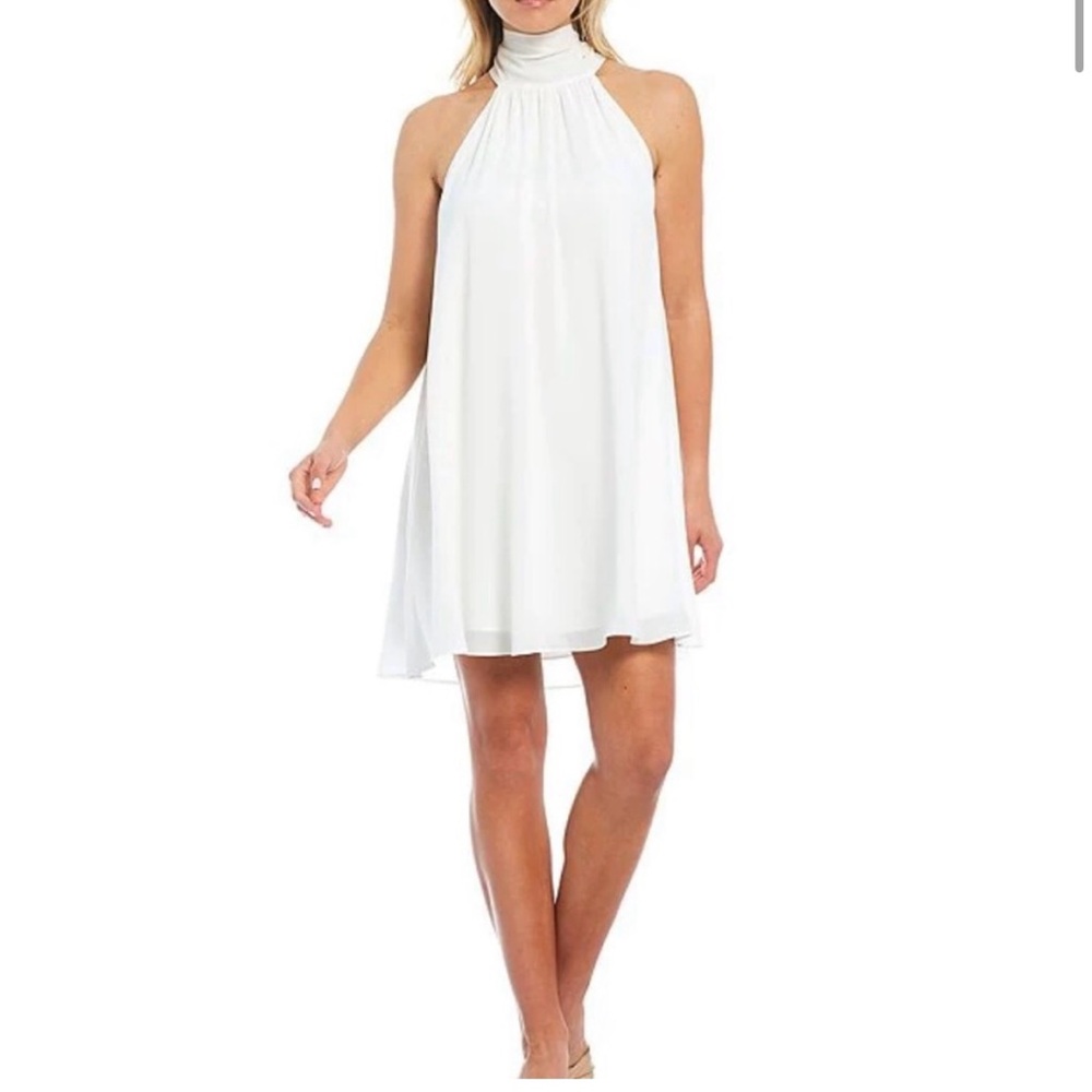 Badgley Mischka Turtleneck Sleeveless Back
Tie Waistless Trapeze Mini Dress